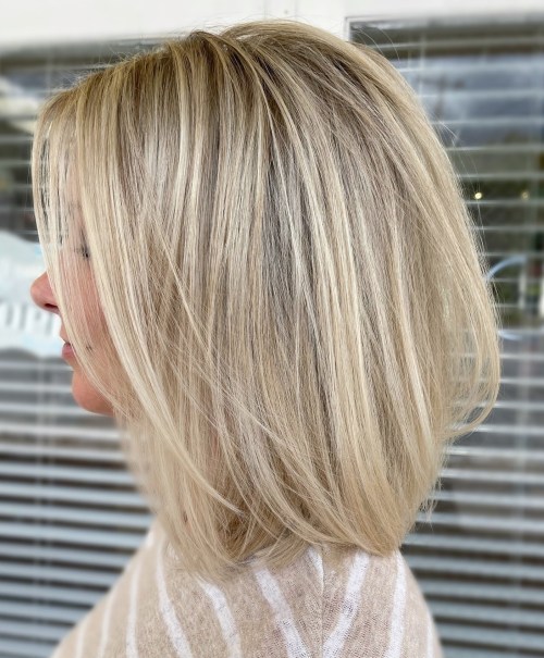 Soft Beige Blonde Lob Blowout Hairstyle