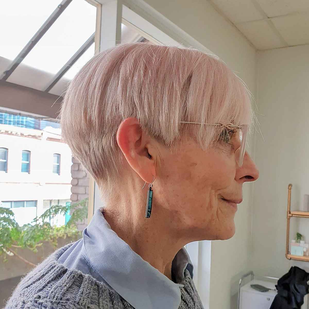 Cropped wedge haircut for 60-year-old older women