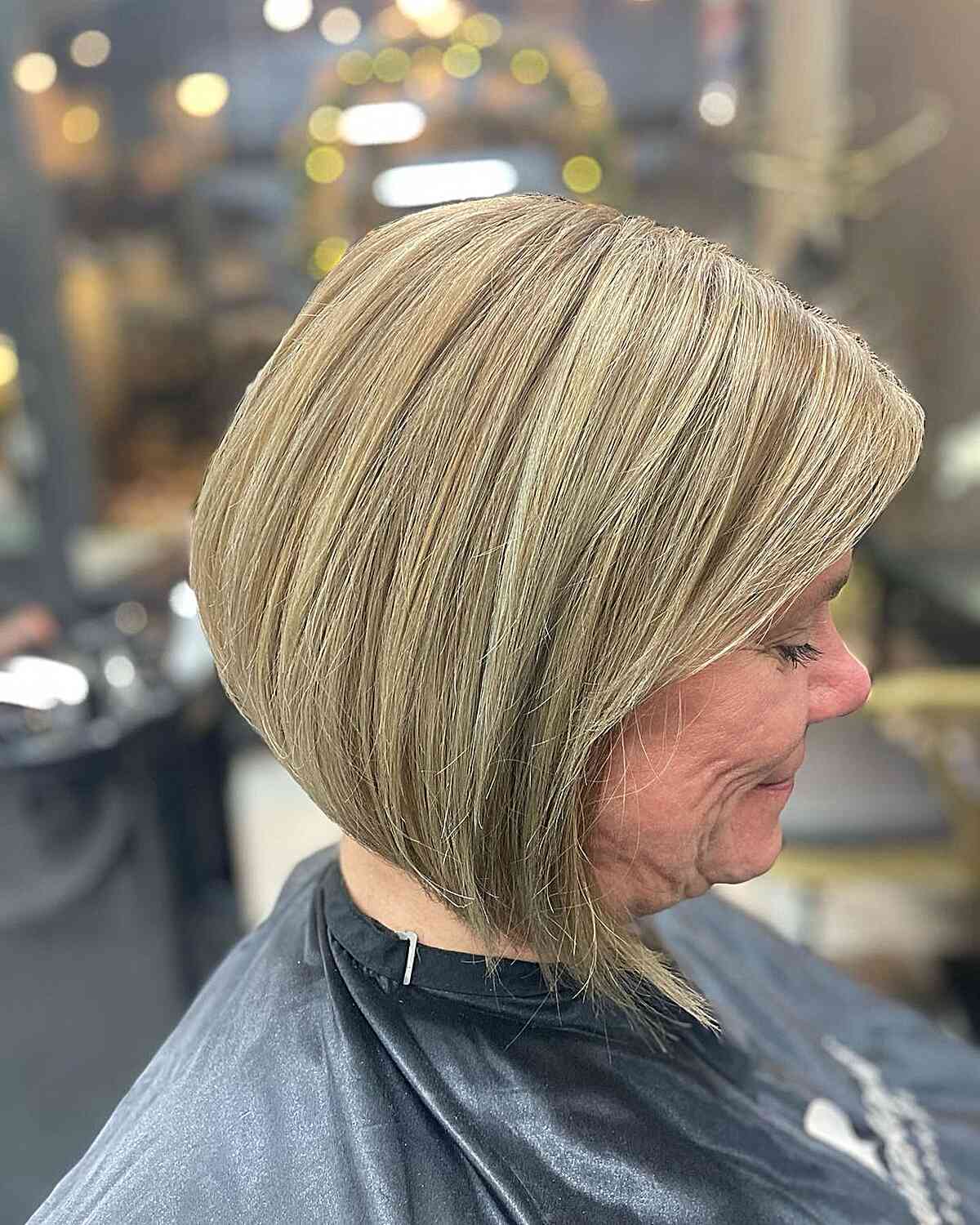 Dimensional Blonde for a Neck-Length Slanted Bob on Senior Women Aged 50