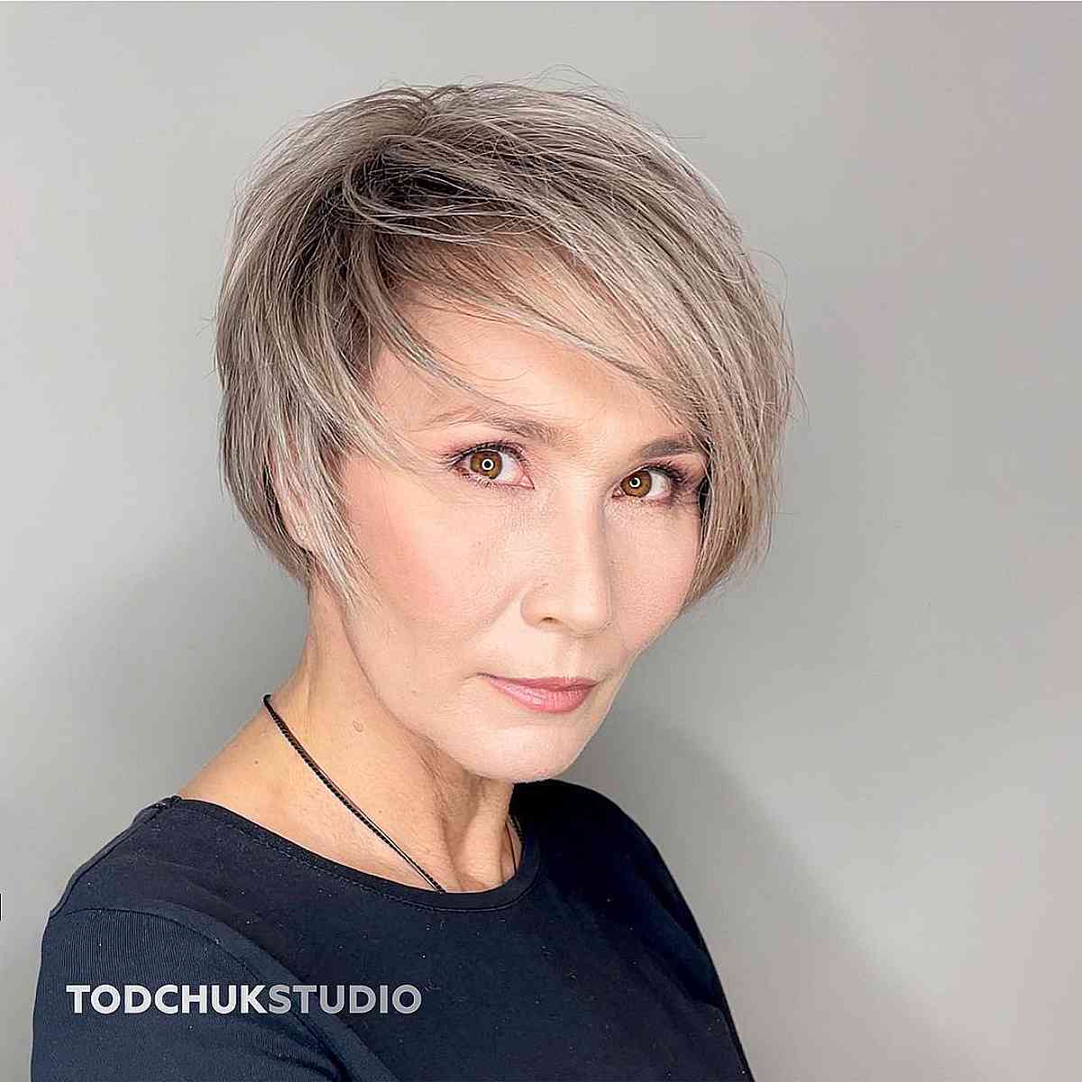 Messy pixie for women in their 50s with thinning hair