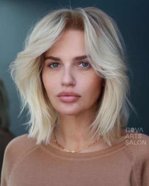 Long Platinum Blonde Bob with Curtain Bangs