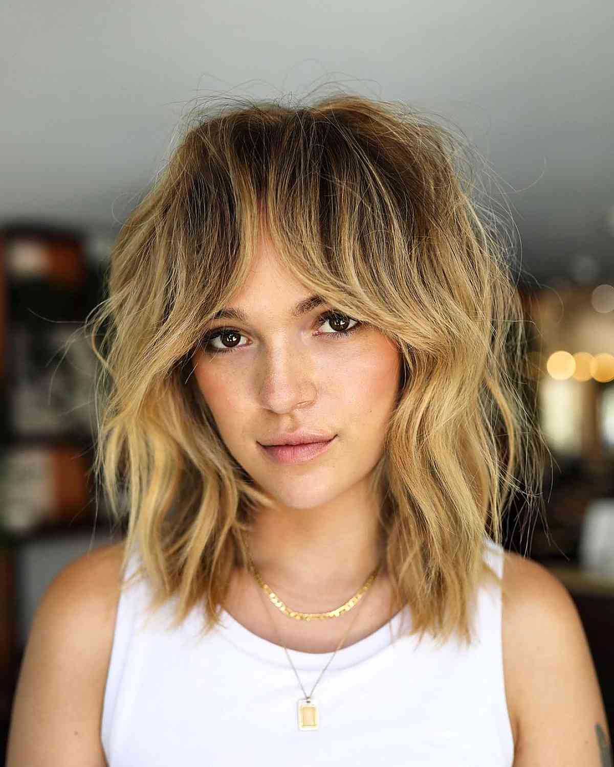 Messy Medium-length wavy hair with bangs