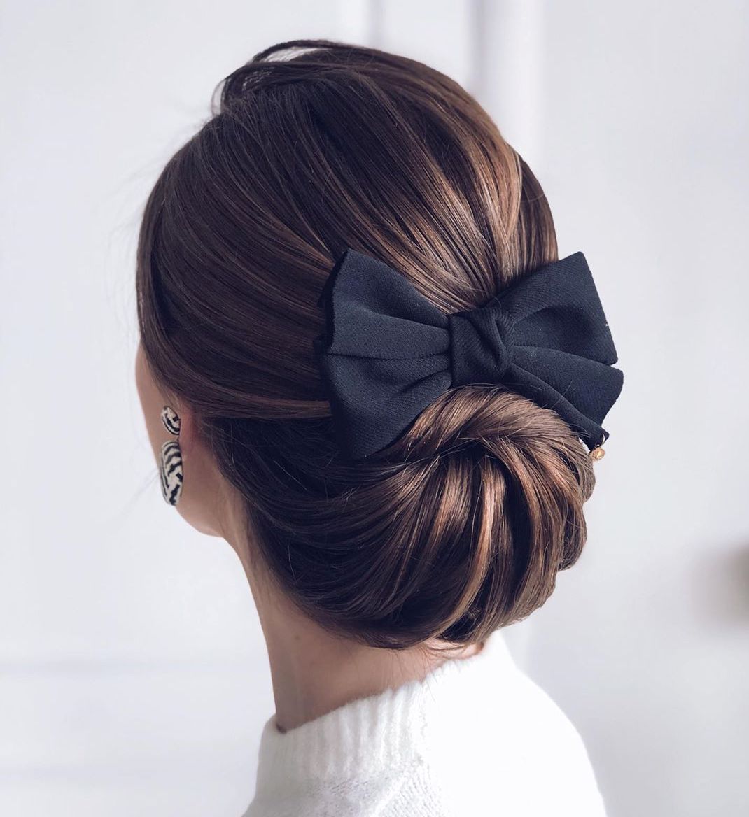 Classic Low Wrap Updo for Women with Long Hair