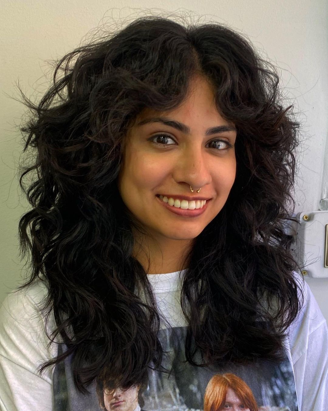 Curtain Bangs Hairstyle for Curly Hair