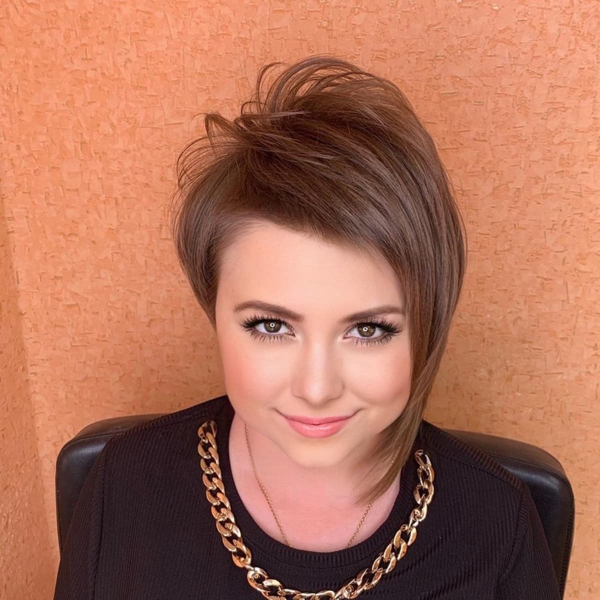 Short shaggy asymmetrical bob