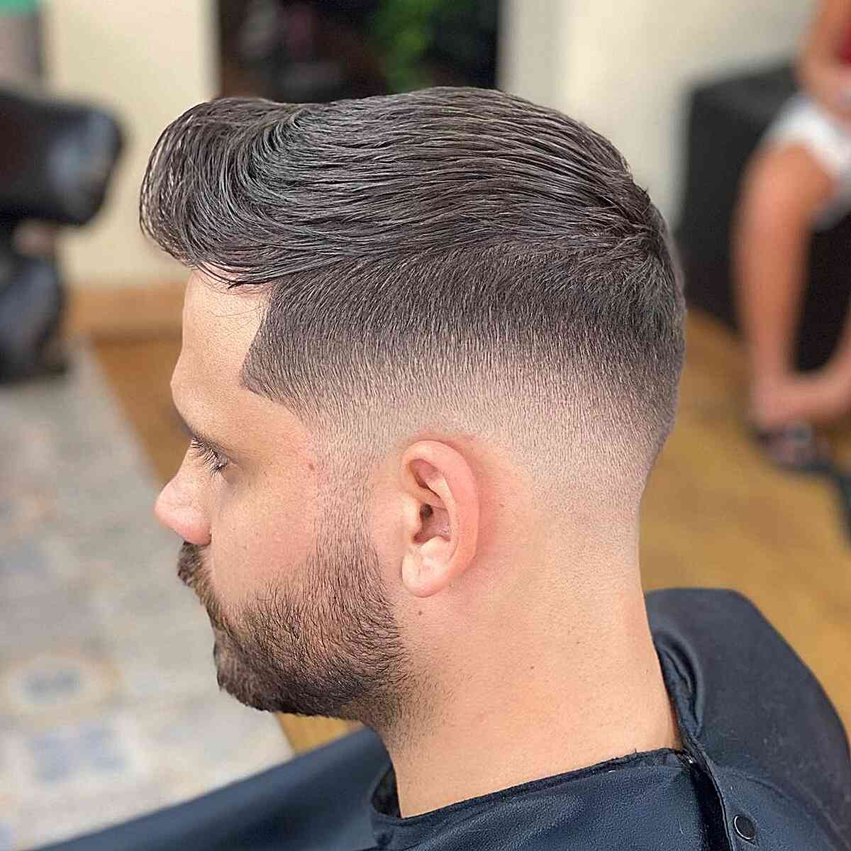 Mid skin fade cut for men