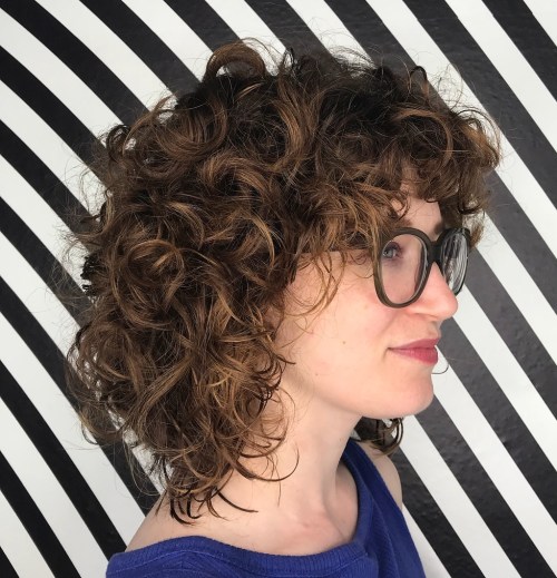 Mid-Length Curly Hairstyle With Bangs