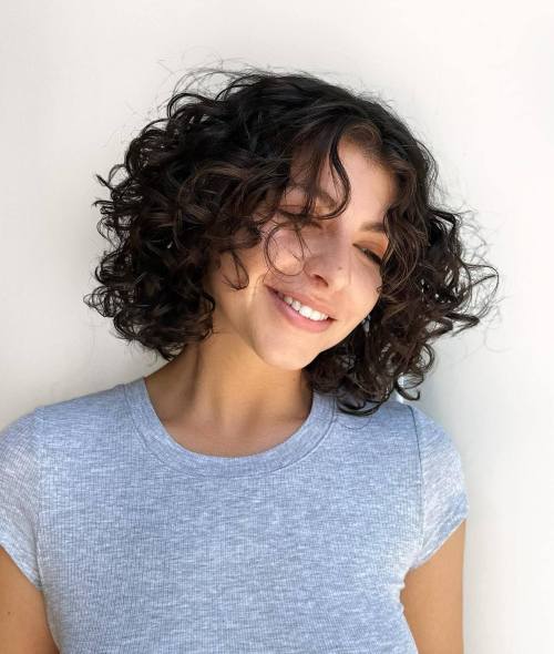 Voluminous Curly Brunette Bob with Layers