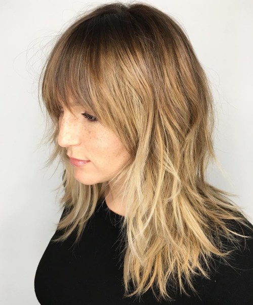 Shoulder-Length Shaggy Haircut With Bangs